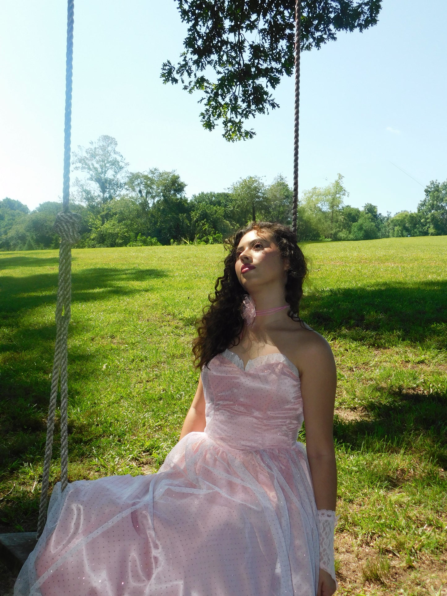 Close-up of pink Jessica McClintock Gunne Sax gown, 1980s prom style with scalloped neckline and sparkle tulle details.