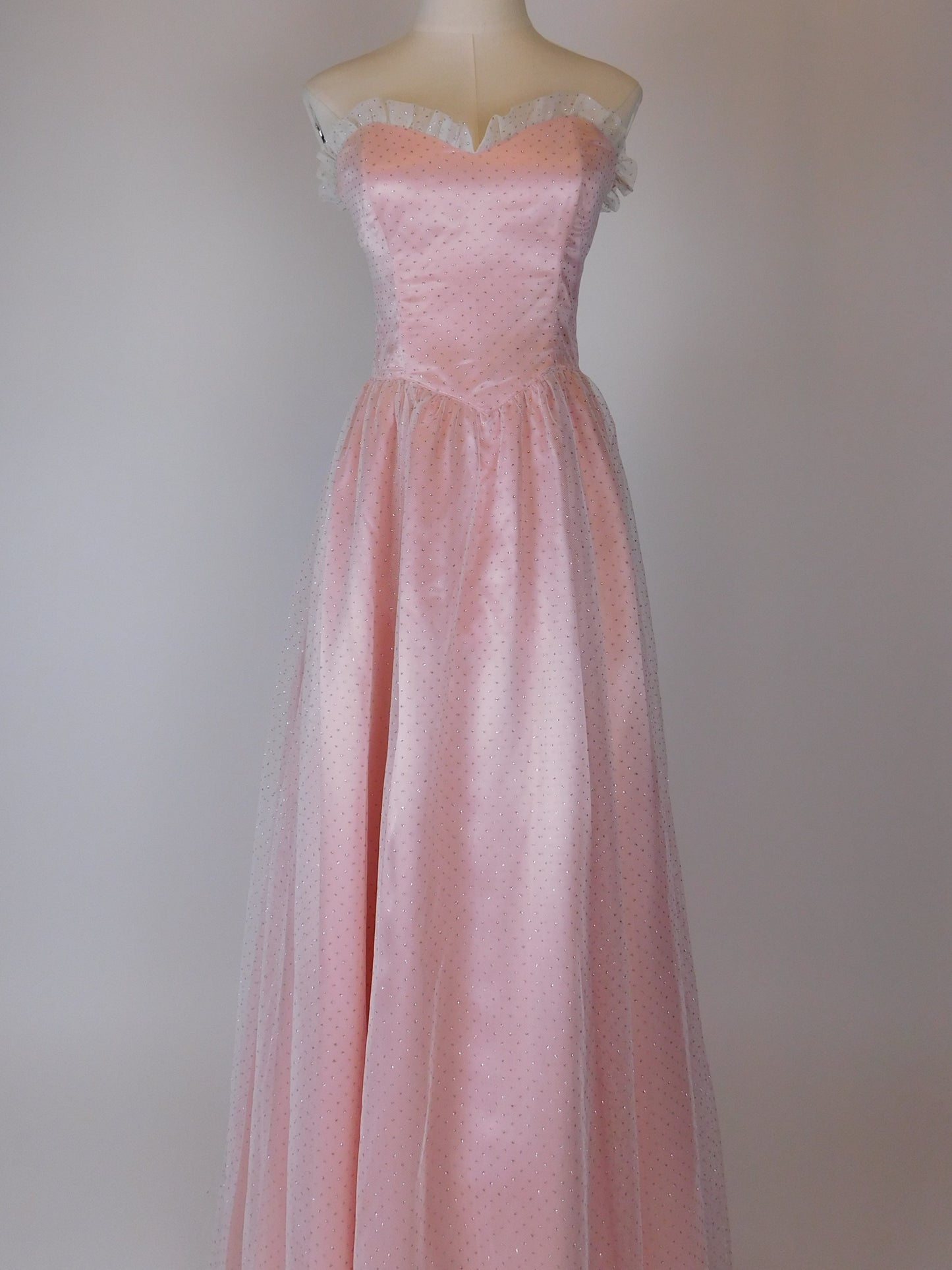 Vintage 1980s Jessica McClintock Gunne Sax pink satin lace strapless formal dress shown on mannequin front view