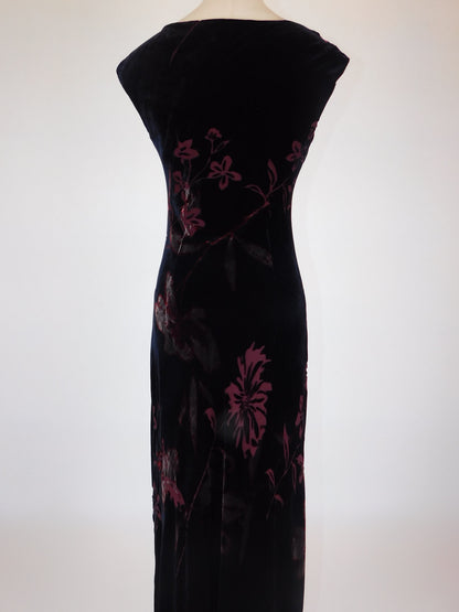 Back detail of floral devoré silk velvet dress on mannequin, showing large floral motif and zip closure